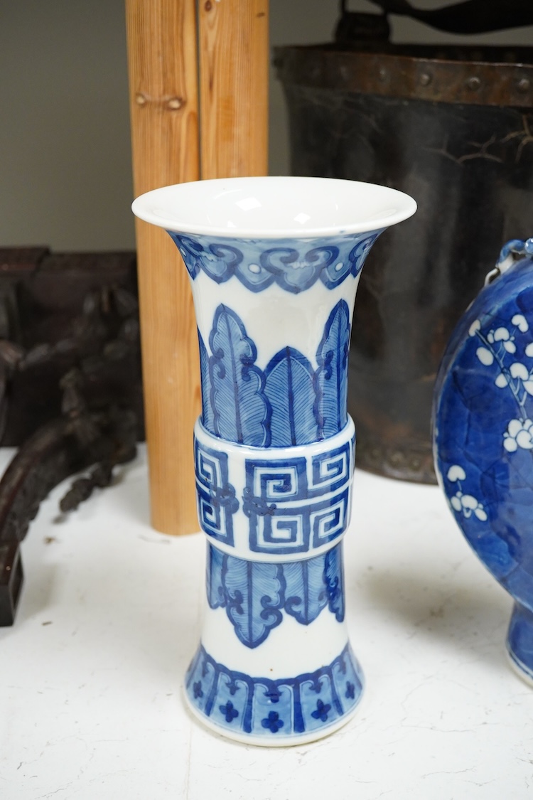 A Chinese blue and white prunus flower moon-flask and a Gu vase, largest 30cm high